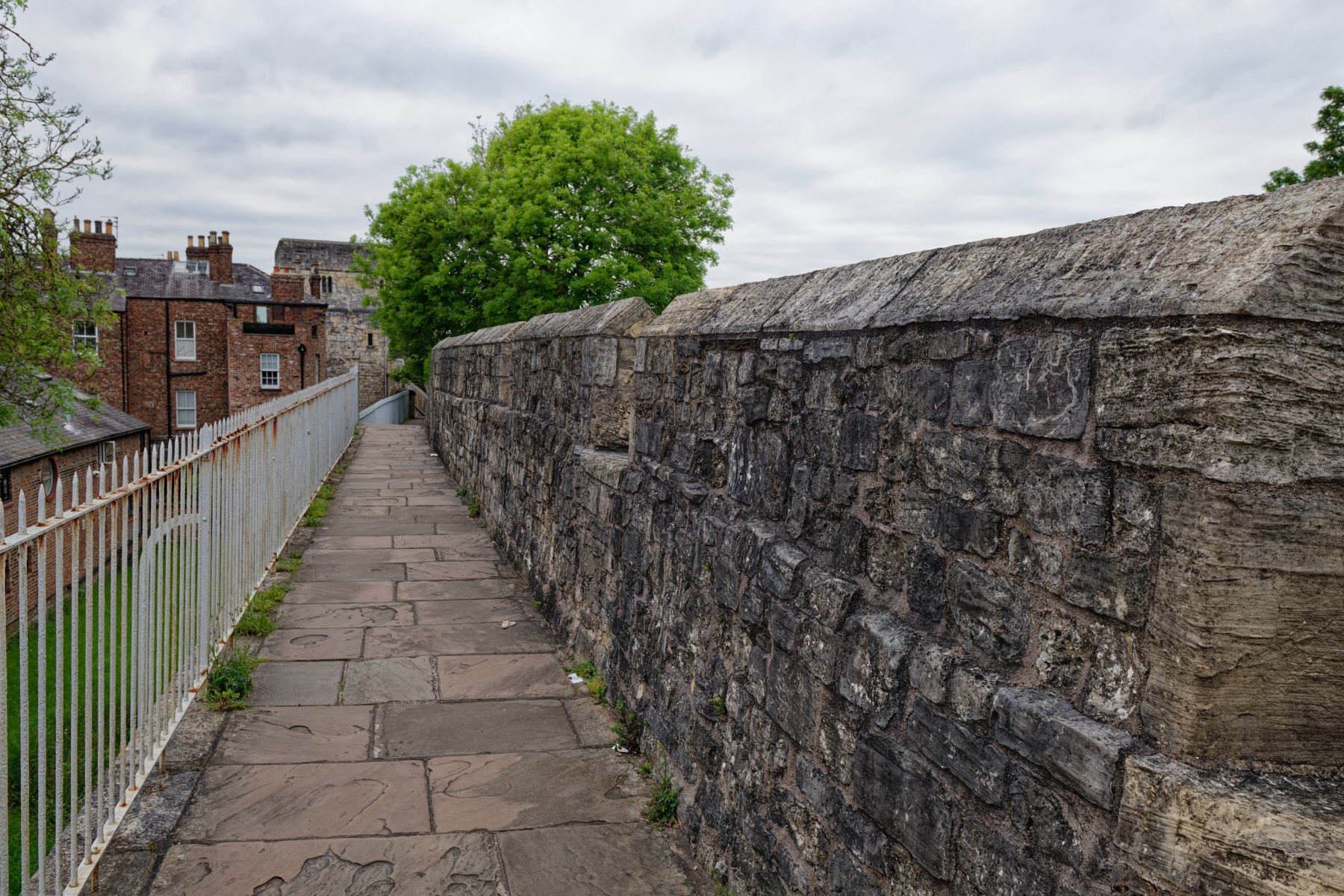 A stone walkway along York city walls, east of Monk Bar